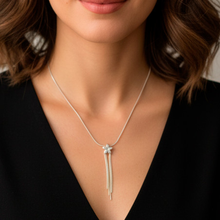 delicate silver necklace with a jasmine