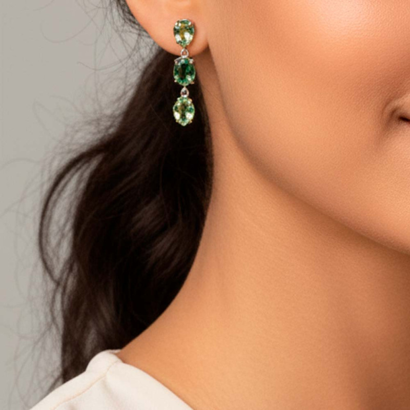long silver earrings with emerald stones