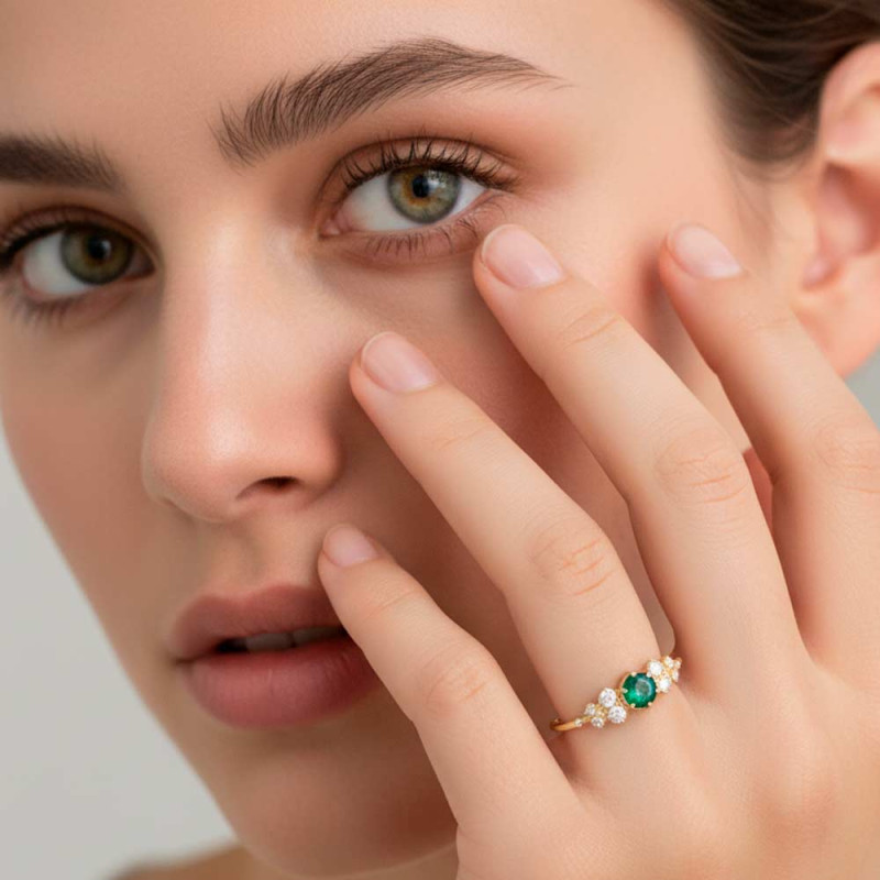 gold ring with diamonds and gemstone