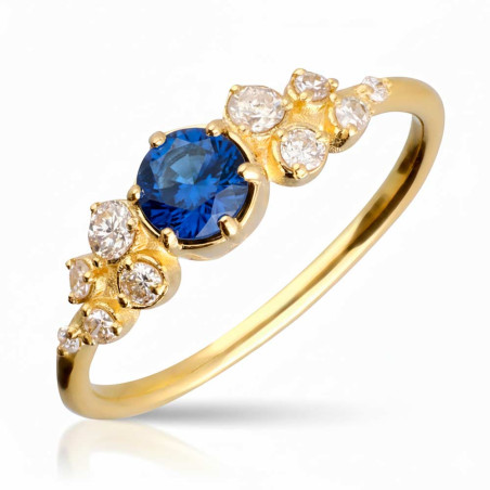 gold ring with diamonds and sapphire