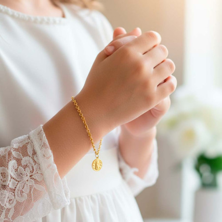 pulsera oro con una medalla