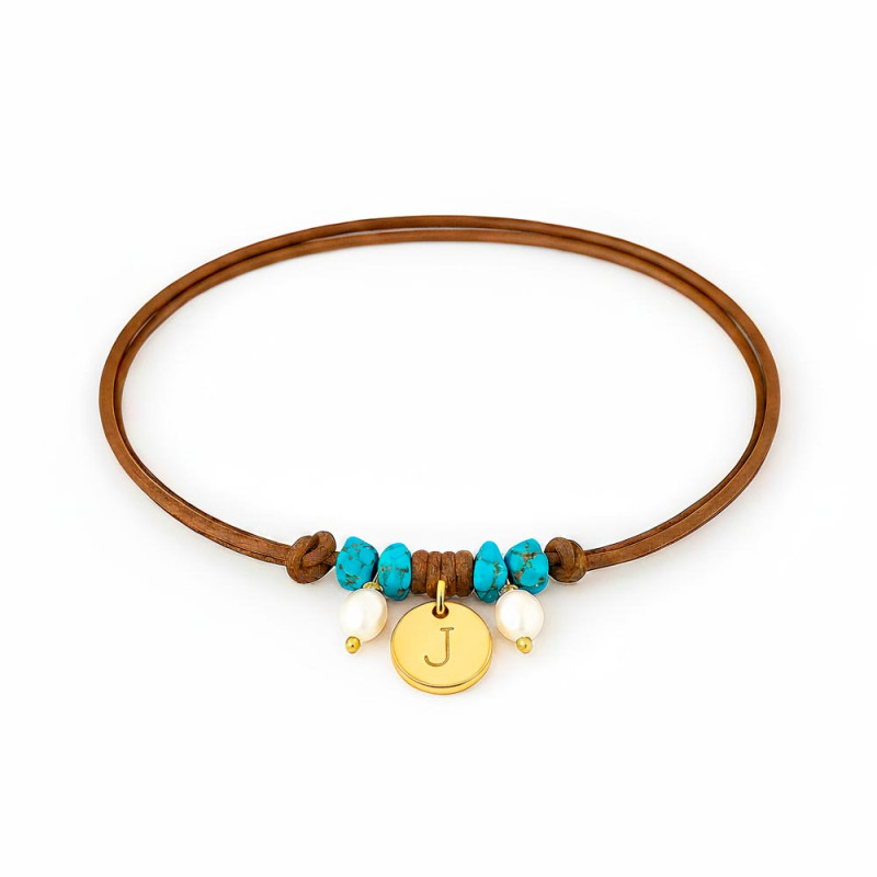 Leather necklace with gold pendant