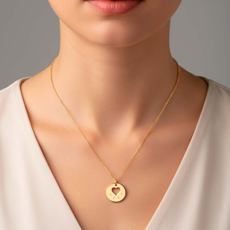 Openwork gold heart pendant