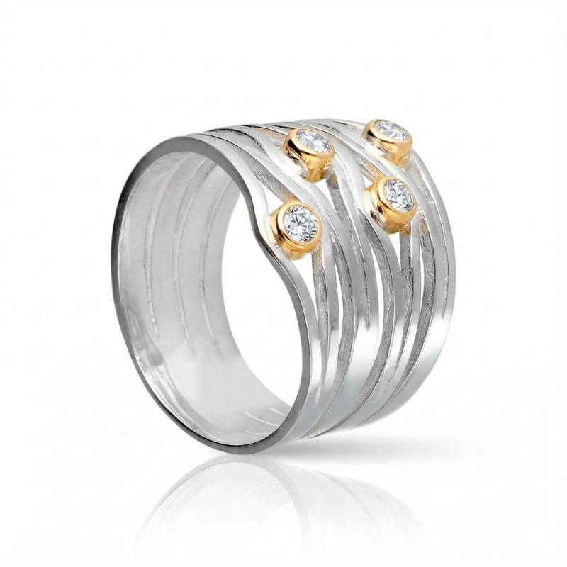 Silver and gold ring with zircons
