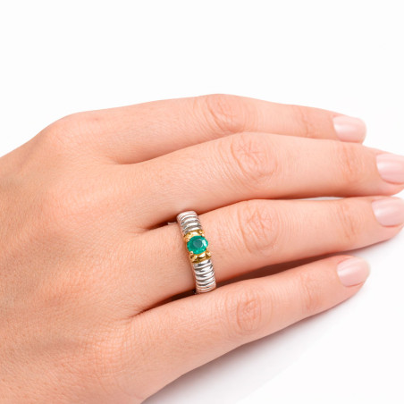 Galloped ring with an emerald set in silver and gold
