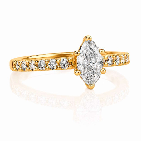 Gold ring with a marquise-cut diamond.