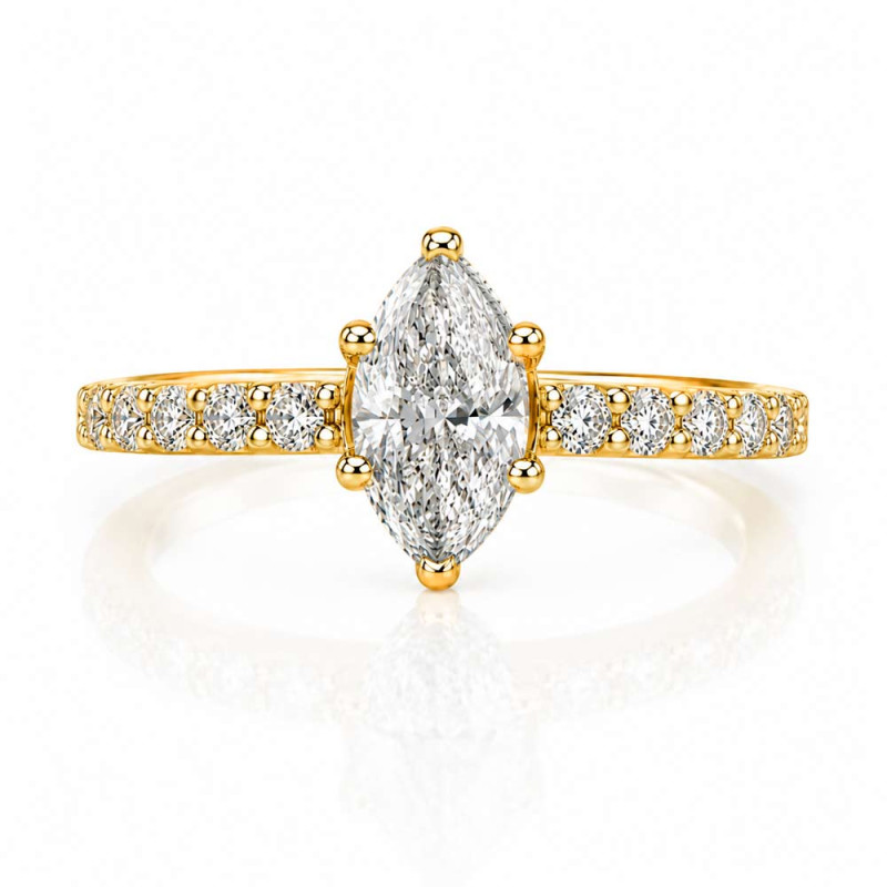 Gold ring with a central diamond and side diamonds.