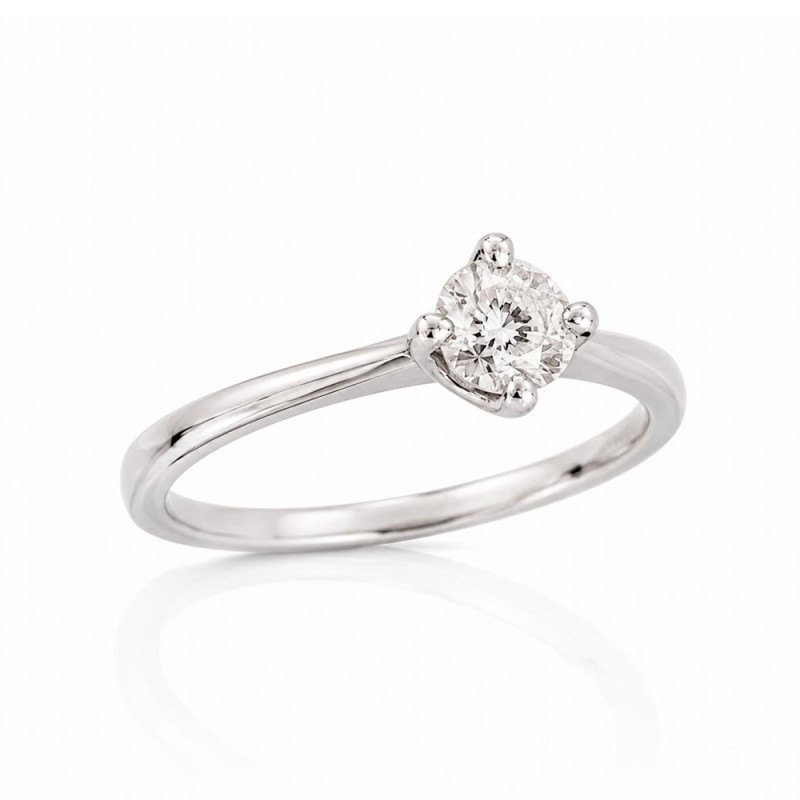 White gold solitaire with a 4mm diamond set with four prongs.