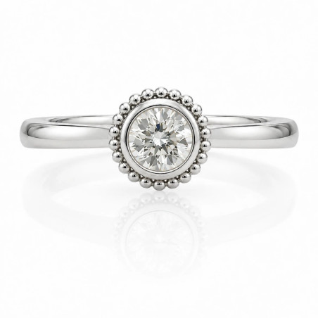 Anillo solitario de oro blanco con diamante de 0,70 quilates y orla de bolitas