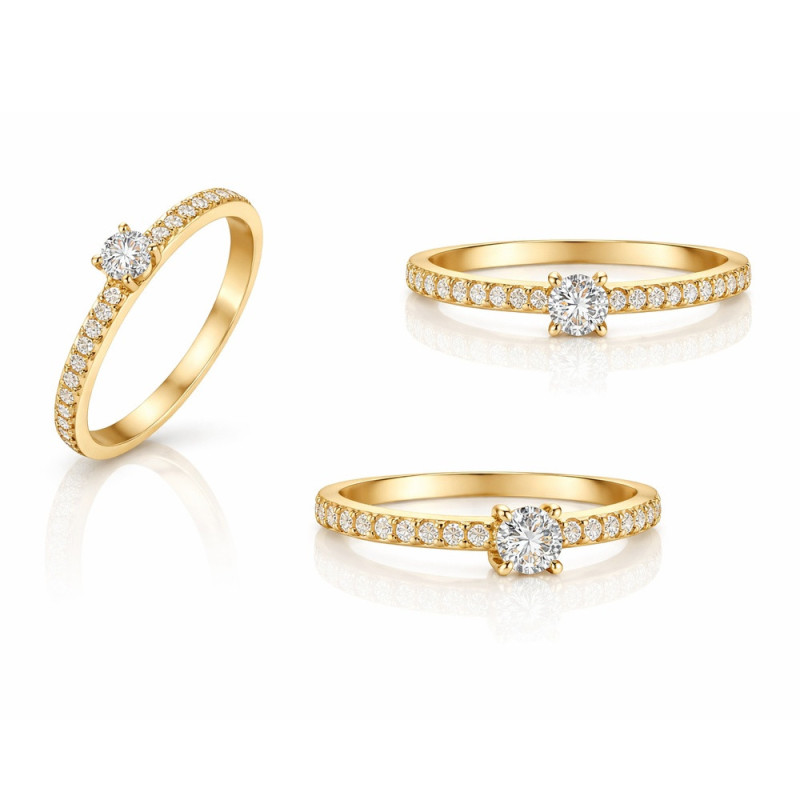 Anillo de oro con diamantes en varias perspectivas