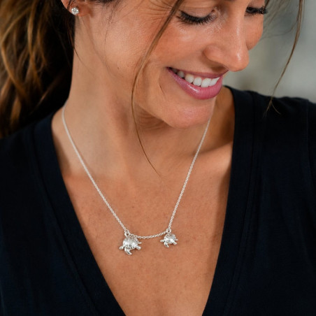 Turtle necklace worn on the neck