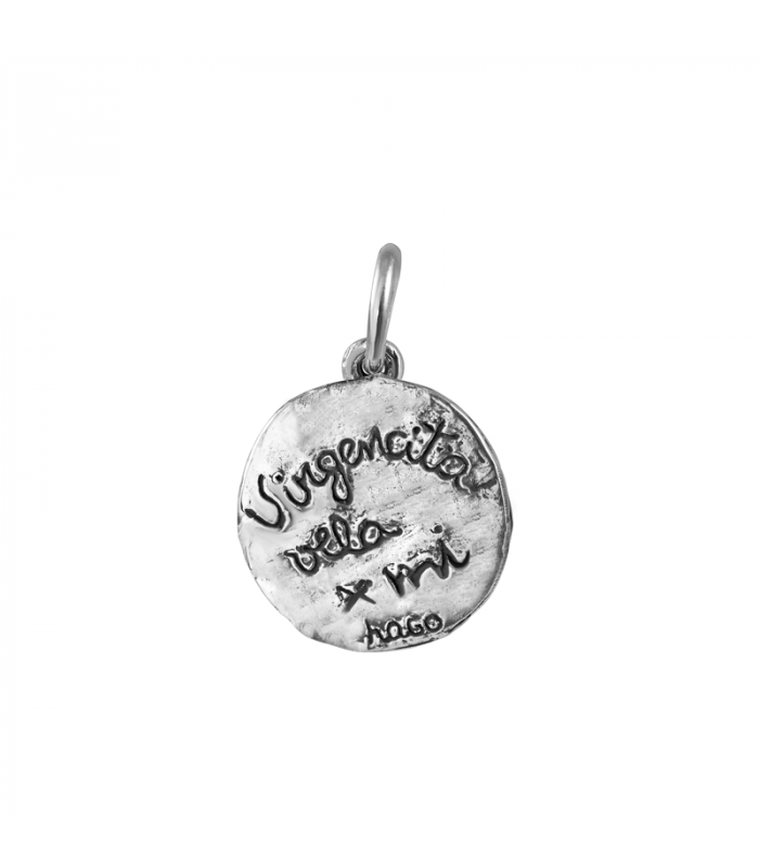 Silver medal pendant with an engraved phrase
