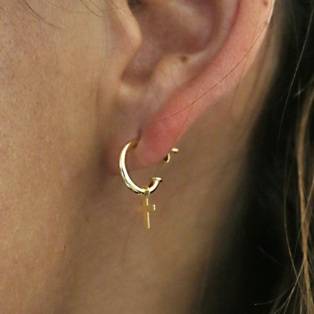 Golden cross hoops.