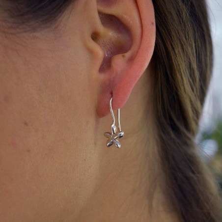 silver earrings in jasmine shape