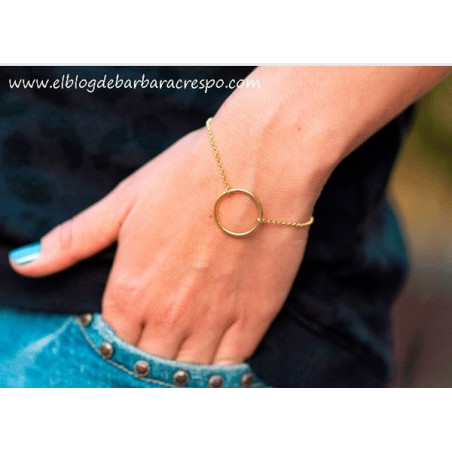 Golden bracelet with ring and chain
