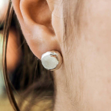 Silver button earrings.