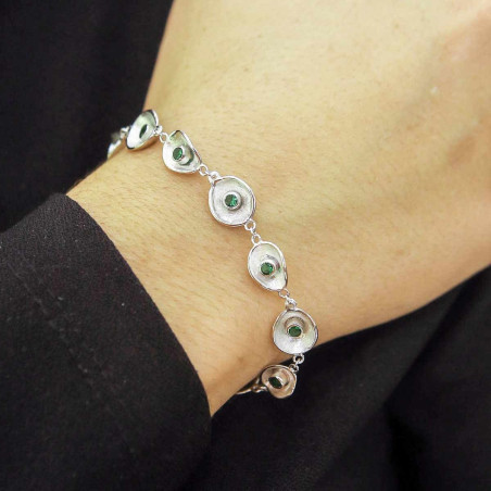 Silver bracelet with green zirconia