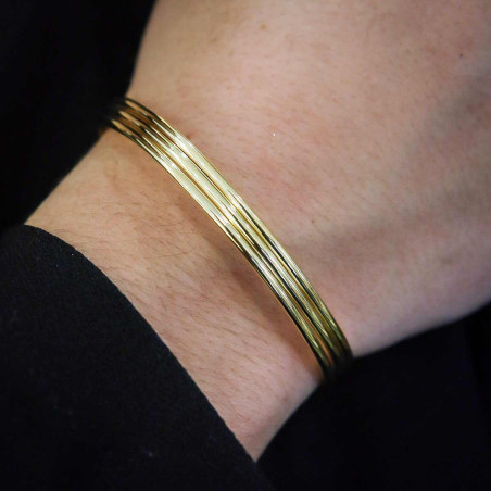 Pulsera tórculo dorada