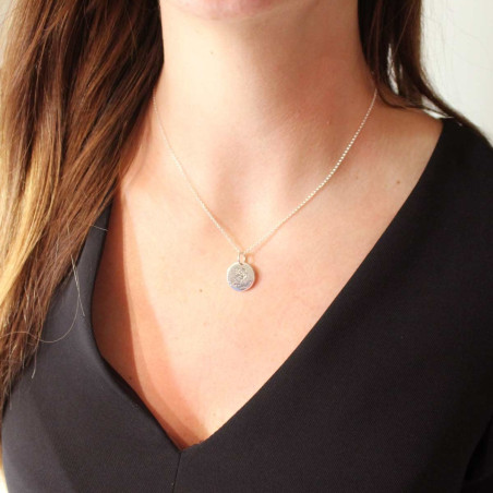 My first communion necklace in silver.