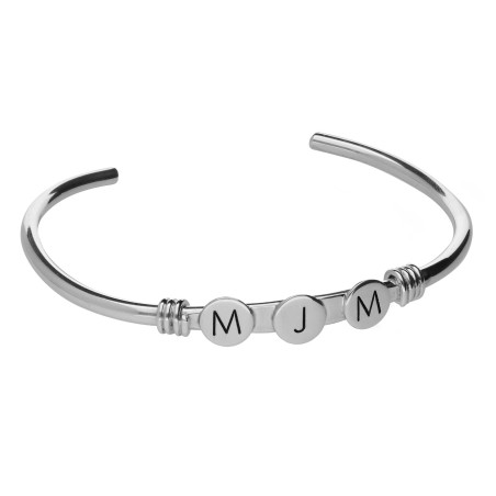 Pulsera tórculo de plata con iniciales