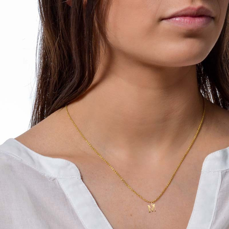 Gold initial pendant letter M