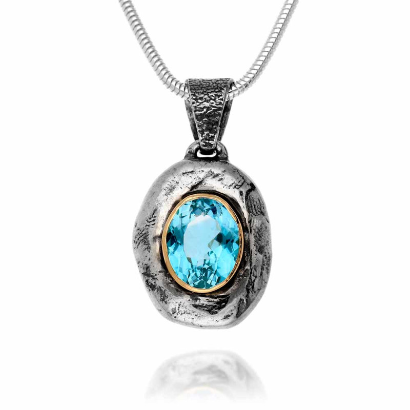 Berta necklace with aquamarine mounted in gold and silver base