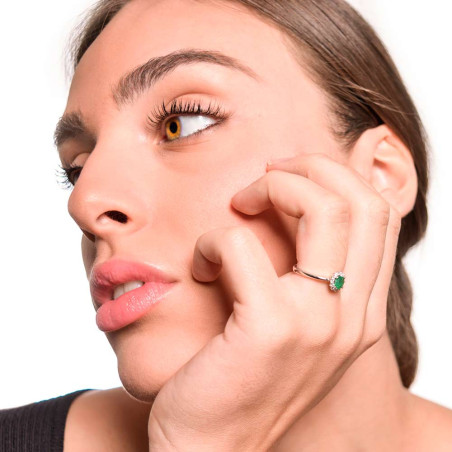 Emerald ring with diamond rosette.