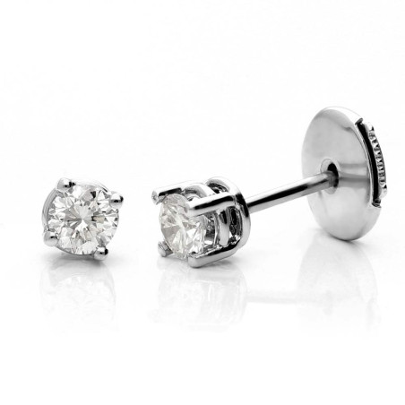 Pendientes oro blanco y diamante con cuatro garras y sistema de tuerca.