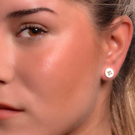 Gold earrings with polar star and white enamel