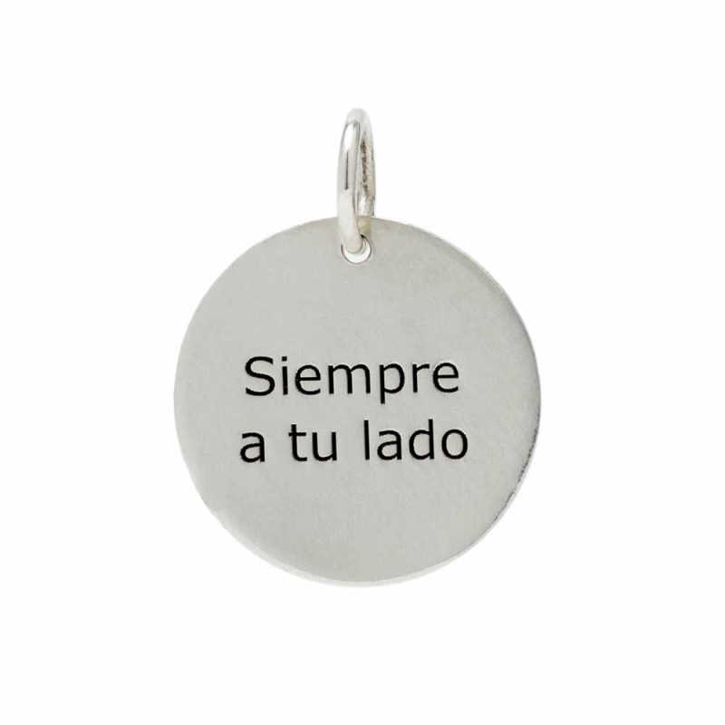 Silver footprint pendant engraved on the back