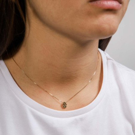Gold necklace for mothers in the shape of a girl with a diamond in the center.