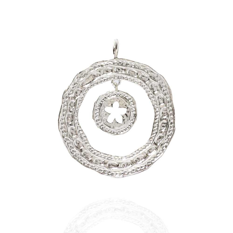 Silver pendant with a jasmine flower in the center and a textured finish