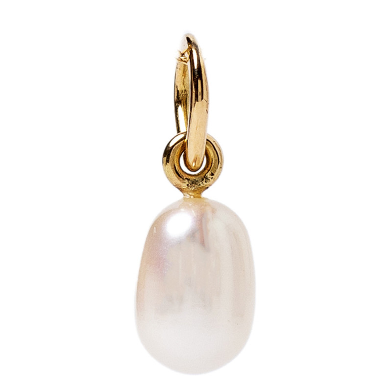 Close-up photo of a pendant with a cultured pearl set in gold.