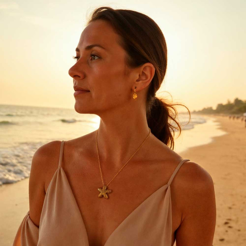 Gold-plated silver jasmine-shaped necklace.